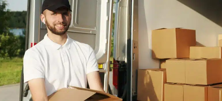 Man holding box delivery boy