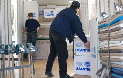 A man picking boxes