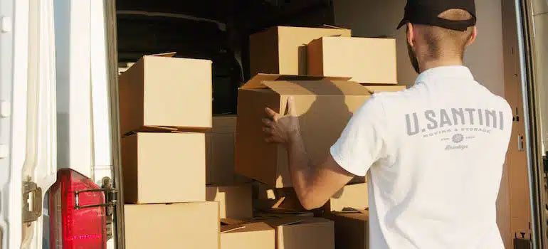 A man holding boxes