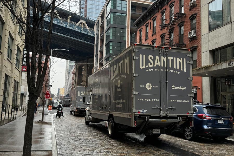 U.Santini moving truck in narrow NYC street